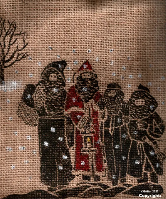 Druck auf Jute: Samichlaus mit Laterne und Schmutzlis im Schneefall, © Y. Grüter 2022
